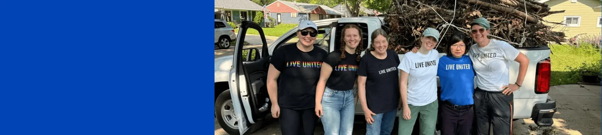 Banner photo with smiling women wearing Live United shirts